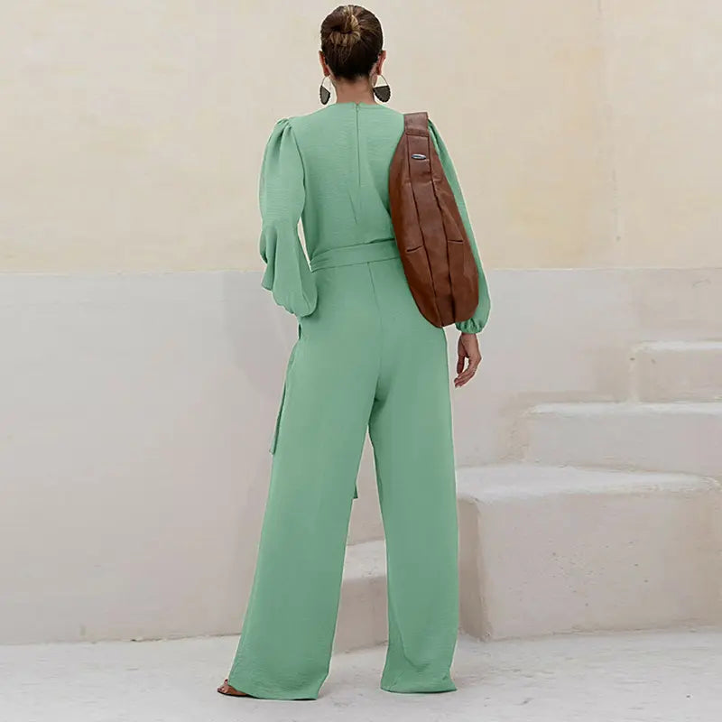 🌿 Women's Puff Sleeve Textured Jumpsuit – Plunge Neck, Waist Tie, Casual Loose Romper with Pockets