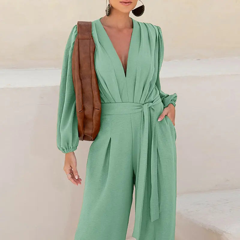🌿 Women's Puff Sleeve Textured Jumpsuit – Plunge Neck, Waist Tie, Casual Loose Romper with Pockets