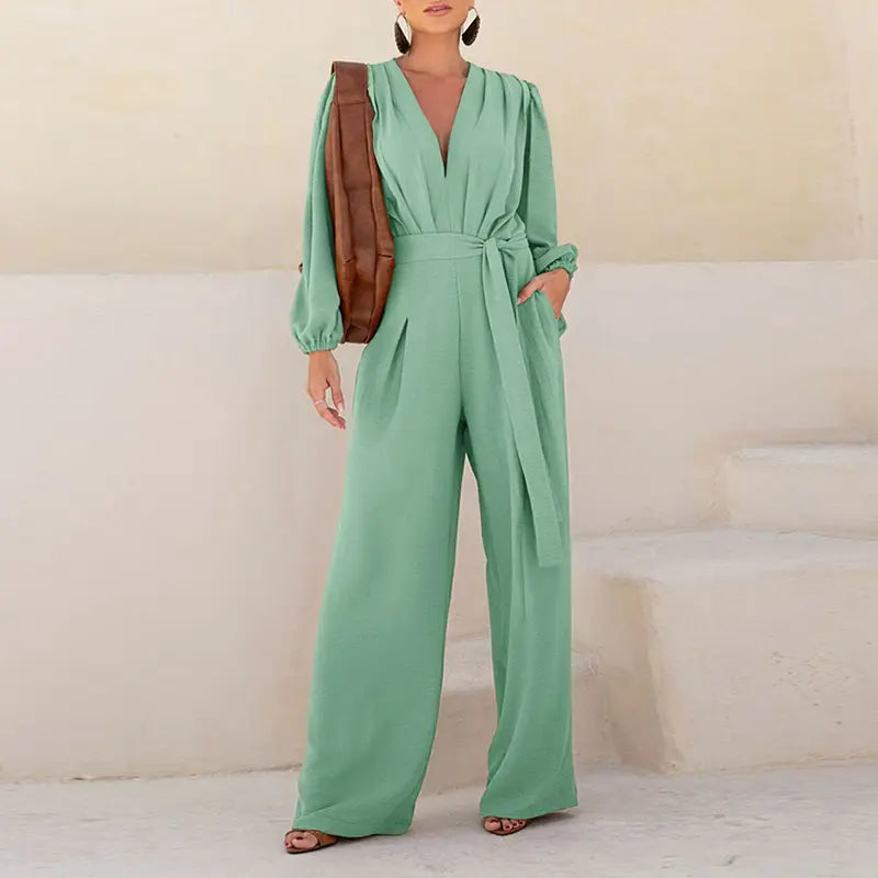 🌿 Women's Puff Sleeve Textured Jumpsuit – Plunge Neck, Waist Tie, Casual Loose Romper with Pockets