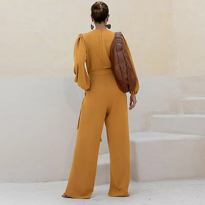 🌿 Women's Puff Sleeve Textured Jumpsuit – Plunge Neck, Waist Tie, Casual Loose Romper with Pockets